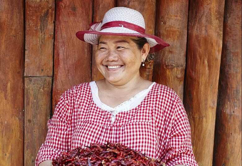 Khun Orapin with a plate full of red chilis